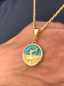 Kit Pingente Oxóssi (26mm) + Corrente Cordão Baiano (2mm) de 60 ou 70 cm Banhada a Ouro e Verniz Italiano.